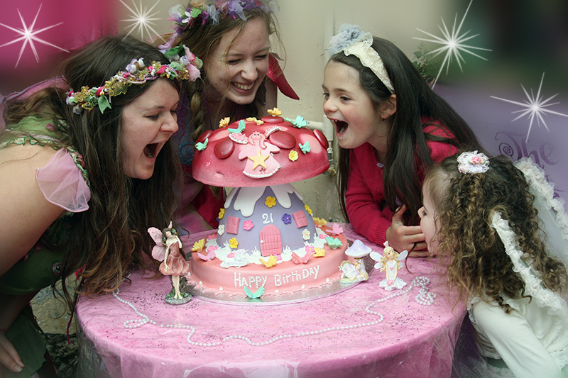 Faerie Sugarsnap with a birthday cake at a party